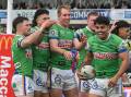 Matthew Timoko (second right) has led ladder leaders Canberra to an emphatic win over Newcastle. Photo: Mick Tsikas/AAP PHOTOS