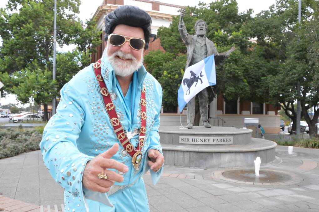 IT'S NOW OR NEVER: Parkes Mayor Ken Keith OAM is all shook up in his blue Elvis jumpsuit with Sir Henry Parkes on backing vocals. Photo: Christine Little
