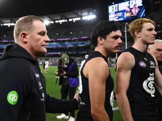 Carlton have been fined by the AFL over their handling of Elijah Hollands (c) on April 16. Photo: Joel Carrett/AAP PHOTOS